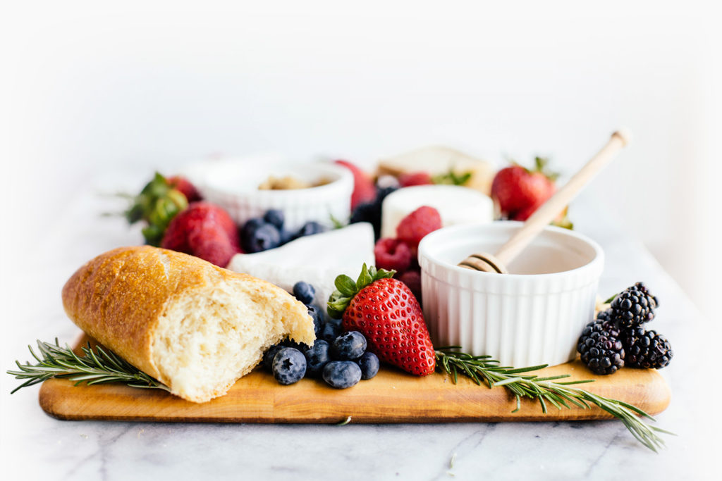 charcuterie board with berries