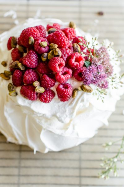 Pistachio Pavlova with Berries & Whipped Cream