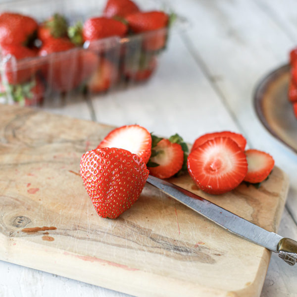 cutting board with strawberries