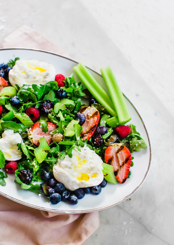 Fresh Salad with Grilled Strawberries and Celery, Berries, Burrata with a Citrus Vinaigrette - Calif