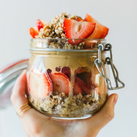 peanut butter berry parfait in a jar