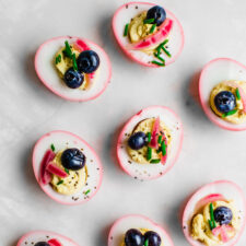 Thanksgiving Deviled Eggs Topped with Pickled Blueberries