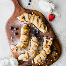 Puff Pastry Bananas Stuffed With Berries, Peanut Butter, and Chocolate Chips